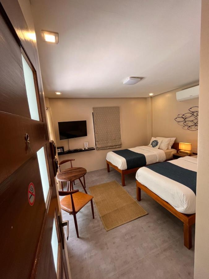 Southseas Beach Resort And Dive Center سانتاندير المظهر الخارجي الصورة